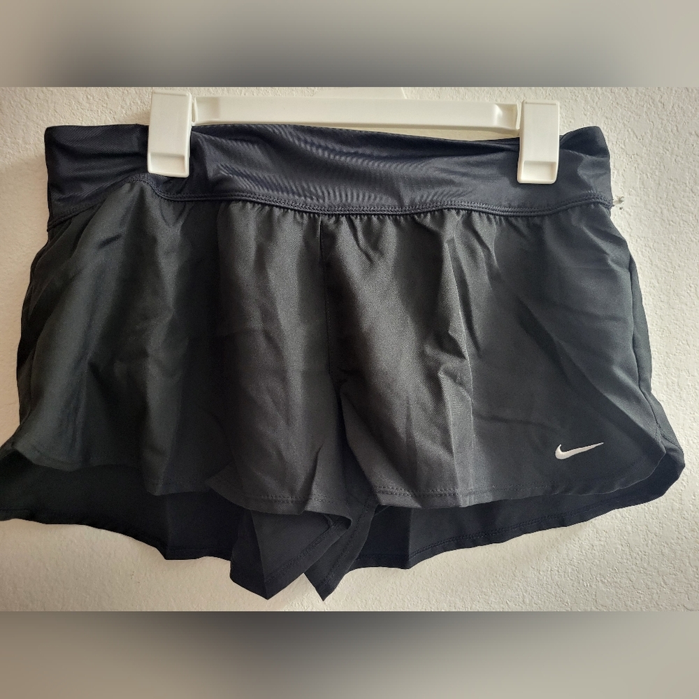 Nike women's swim shorts with built in panty underneath. Size L